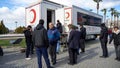 People donate blood to the Red Crescent blood bank in order to help the injured people in the earthquake area in Turkey