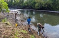 People draw water from the Mago River to bottles. Omo Valley. Et Royalty Free Stock Photo