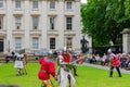 People dress up in medieval clothes doing performance in front of The British Museum