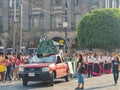 People dress up in traditional clothes parade in the street