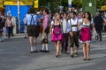 People dressed in traditional bavarian clothes at the Oktoberfest in Munich