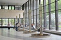 People drink water in gallery of mineral sources in Karlovy Vary