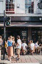 People drinking outside The Old Crown pub on New Oxford Street, London, UK. Royalty Free Stock Photo