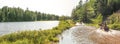 People driving ATV quads through water. Lake in Ontario, Canada. Royalty Free Stock Photo