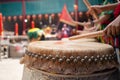 People drumming the Chinese drums to celebrate Lunar New Year.