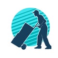 Silhouette of a male worker pushing lori wheels transporting carboard boxes. Royalty Free Stock Photo