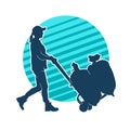 Silhouette of a female worker pushing lori wheels transporting sacks Royalty Free Stock Photo