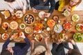 People eat healthy meals at served table dinner party Royalty Free Stock Photo