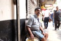 People eat in a small street restaurant in Kolkata