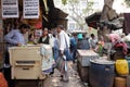 People eat in a small street restaurant in Kolkata