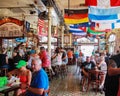 People eating and drinking in side the famous Sloppy Joes bar and resturant on Duval Street in Key West Florida USA