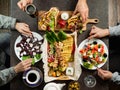 People eating Greek food. Greek cuisine Royalty Free Stock Photo