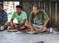 People eating with hands in chitwan,Nepal