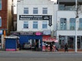 People eating outside the beachcomber restaurant and fish and chips takeaway on the promenade in blackpool Royalty Free Stock Photo