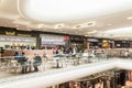 People Eating At Restaurant In Luxury Shopping Mall Interior