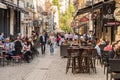 People Eating At Restaurant In Luxury Shopping Mall Interior