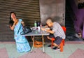 People eating street foods in Kuala Lumpur