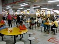 People eating at a typical Singapore food court or Hawker Royalty Free Stock Photo