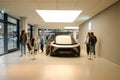 people, electric car enthusiasts looking NIO model EVE, showcases future of autonomous intelligent driving, electric car by Nio,