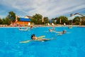 People are engaged in water aerobics in pool Royalty Free Stock Photo