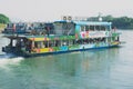 People enjoy boat cruise by the Li (Lijang) river between Guilin and Yangshuo, Guilin, China.