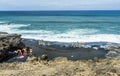 People enjoy the huge waves