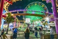 people enjoy the ocean park at Santa Monica pier by night Royalty Free Stock Photo