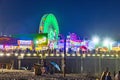 People enjoy the ocean park at Santa Monica pier by night Royalty Free Stock Photo