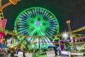 People enjoy the ocean park at Santa Monica pier by night Royalty Free Stock Photo