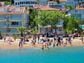 People enjoy the sea at a beach at Bosporus