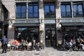 PEOPLE ENJOY SUMMER DAY AT CAFE