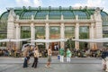 People enjoy the summer day in front of the Palm House in Vienna, Austria Royalty Free Stock Photo