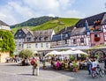 people enjoy the summer day at market place with medival half timbered houses in Bernkastel-Kues, Germany Royalty Free Stock Photo