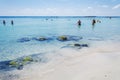 People enjoy a sunny day on Elafonisi beach in Crete, Greece Royalty Free Stock Photo