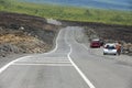 People enjoy the view to the asphalt road over volcanic lava in Sainte-Rose De La Reunion, France.