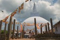 People enjoy the view to the Ruwanwelisaya stupa in Anuradhapura, Sri Lanka.