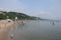 People enjoy the warm summer weather at Bluffer`s Park Beach