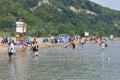 People enjoy the warm summer weather at Bluffer`s Park Beach