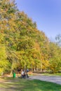 People enjoying the autumn sun on a bench in Borger