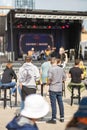 People enjoying the bar and live music at the free Little Tennessee event in Liberty Village