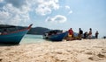 Tourist spend time at a beach in Pulau Beras Basah in Langkawi in sunny day.