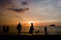 People enjoying the beautiful four colors sunset in the Rodadero beach, Santa Marta, Colombia Royalty Free Stock Photo