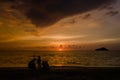 People enjoying the beautiful four colors sunset in the Rodadero beach, Santa Marta, Colombia Royalty Free Stock Photo