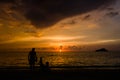 People enjoying the beautiful four colors sunset in the Rodadero beach, Santa Marta, Colombia Royalty Free Stock Photo