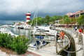 People enjoying beautiful Harbour Town Marina in South Carolina. Royalty Free Stock Photo