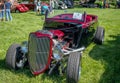 People Enjoying a Beautiful Summer Day Viewing Vintage Cars