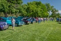 People Enjoying a Beautiful Summer Day Viewing Vintage Cars