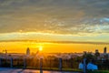 People enjoying colorful sunset