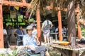 People enjoying company, food and drink at Washaway Cafe at Avatele Niue