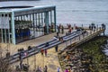 People enjoying the day at Brooklyn Bridge Park near Jane's Carousel.